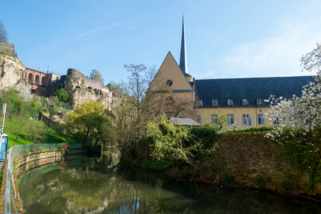 Downtown of Luxembourg City, view with Alzette river. NeumÃ¼nster Abbey and Johanneskirche のeditorial素材