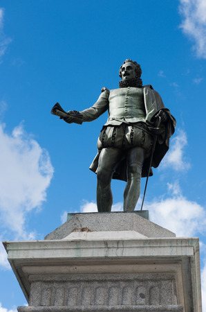 Statue of Miguel de Cervantes - Spanish novelist, poet, and playwright on Plaza de las Cortes in Madrid, Spainのeditorial素材
