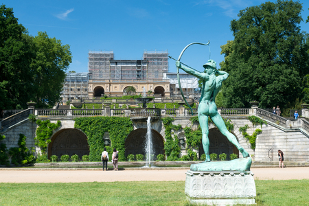 POTSDAM, GERMANY -  JUNE 07, 2015: Statue and garden in front of Orangery Palace in Sanssouci park in Potsdam, Germanyのeditorial素材