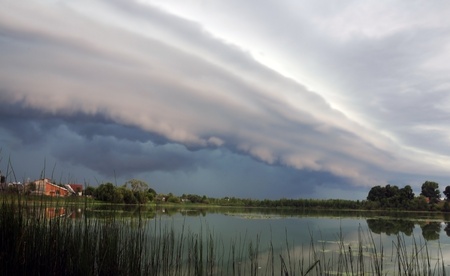 sky before a storm on the lakeの写真素材