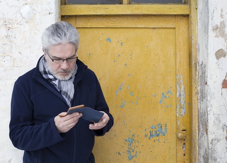 Man looking at smartphoneの写真素材