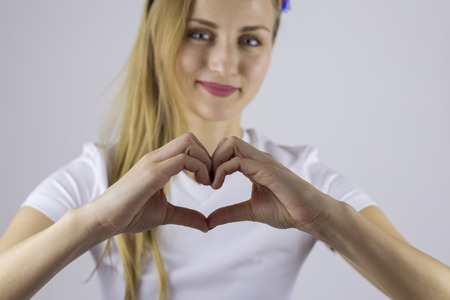 Fingers folded in heart shapeの写真素材