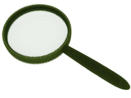 Magnifying glass in rim of grass isolatedの写真素材