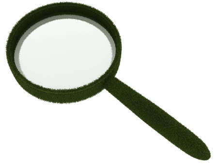 Magnifying glass in rim of grass top viewの写真素材