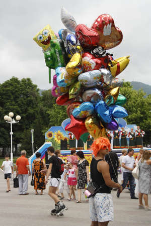 Gelendzhik, Russia, 4 june 2011. Carnival in town of resort Gelendzhik. Man with many balloon.のeditorial素材