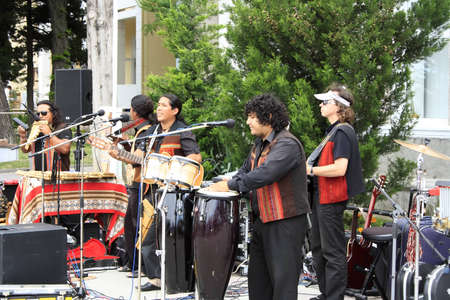 Gelendzhik, Russia, 4 june 2011.  Carnival in town of resort Gelendzhik. Man in stilize with drum in action.のeditorial素材