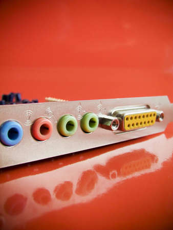 Compuret Sound card back front on the red backgroundの写真素材