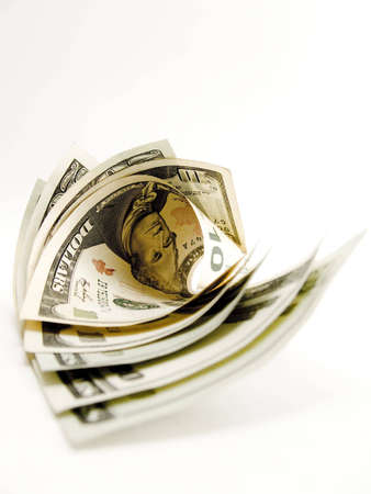 Ten and Twenty dollars on the white backgroundの写真素材