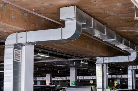 Equipment for ventilation and ceiling insulation systems in the Parking lot in the basement of a...