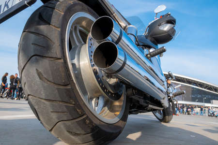 Kazan, Russia-September 26, 2020: Rear view of the chrome exhaust pipes of a parked Honda motorcycleのeditorial素材