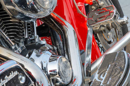 Kazan, Russia-September 26, 2020: Close-up of the engine part of a Harley Davidson motorcycle standing in a parking lot during a biker meetingのeditorial素材