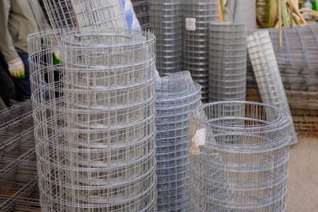 Galvanized welded wire mesh for strengthening masonry or making fences, twisted into rollsの写真素材