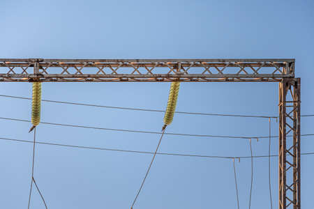 High-voltage power lines. Electricity distribution station. High voltage electric transmission tower.の写真素材