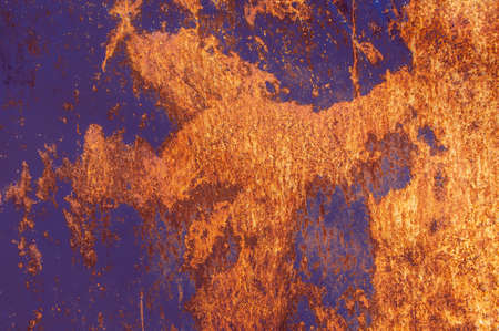 Colored grunge texture background. Abstract texture on an old rusty metal wall. Dirty tinted iron...