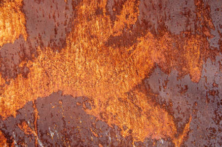 Colored grunge texture background. Abstract texture on an old rusty metal wall. Dirty tinted iron...