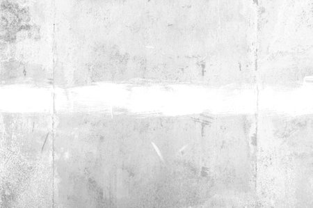 Black and white grunge texture background. Abstract texture on an old rusty metal wall with a wide stripe. Dirty iron battered background with a space.の写真素材