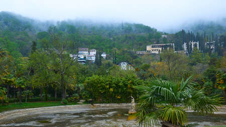 View from the sea coast of old Gagra in cloudy weather. Restaurant Gagripsh. Beautiful landscapes of...