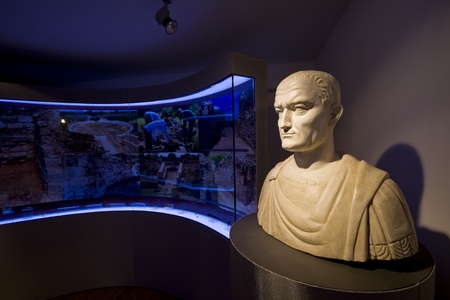The museum of Burnum archeological site with the exhibits of the amphitheatre, Roman bust and phographed items. Ancient Burnum is the Roman military camp, the town had a sanctuary, an amphitheatre, a 15 km long aquaduct and paved streets. It was destroyedのeditorial素材