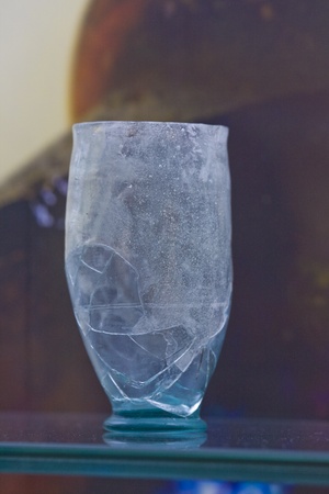 Ancient Roman glass vase in the Burnum museum. The museum of Burnum archeological site with the exhibits of the amphitheatre, Roman bust and phographed items. Ancient Burnum is the Roman military camp, the town had a sanctuary, an amphitheatre, a 15 km loのeditorial素材