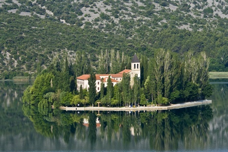 Visovac monastery, and the Visovac island part of the National park Krka, as settled and built in the 14th century. Today the rich monastery library includes particularly rare incunabula of Aesop`s fables from the 15th century.のeditorial素材