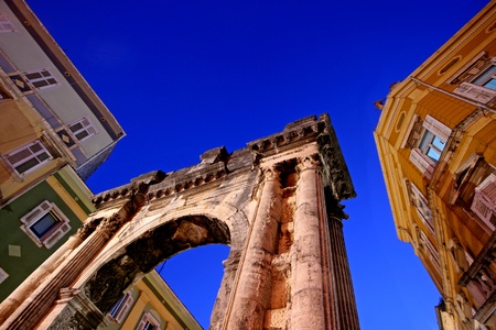 Arch of the Sergii is an Ancient Roman triumphal arch located in Pula, Croatia. approximate date of construction : 29-27 BC. The honorary triumphal arch, originally a city gate, was erected as a symbol of the victory at Actium. This arch has attracted theの写真素材