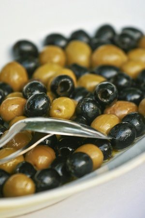 Black and green olivesの写真素材