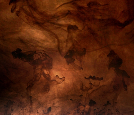 Black ink in brown waterの写真素材