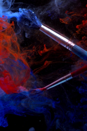 Red and blue brushes in the water