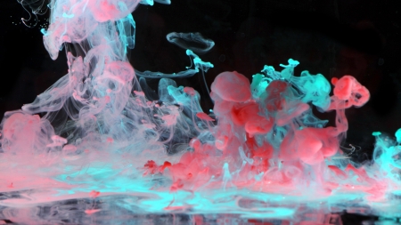 Red and blue ink in the waterの写真素材