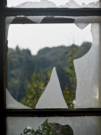 Broken glass on the old windowの写真素材