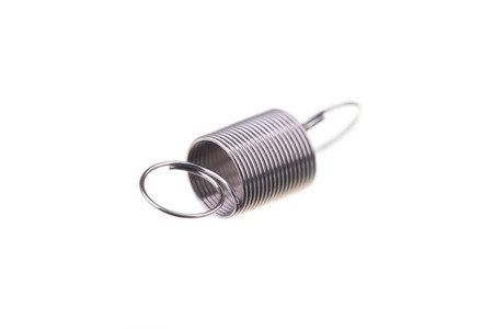 Coil spring, metal spring on an isolated background
