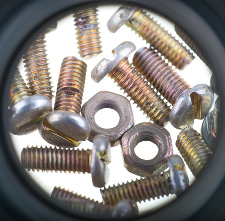 screw and nut isolated on white backgroundの写真素材