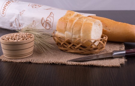 assortment of baked bread on wood tableの写真素材