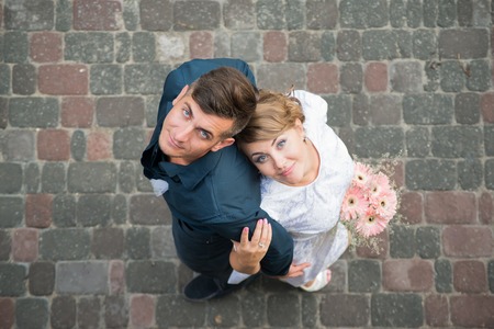 Happy bride and groom at the wedding walkの写真素材
