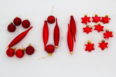 Inscription Christmas-tree decorations 2015 on snow