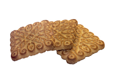 Three sugar cookies on the white isolated backgroundの写真素材