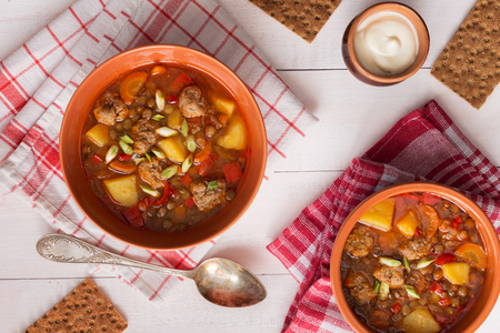 horizontal photo of lentil soup with meatballs and cream sauceの写真素材