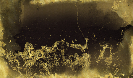 Black background with gold scuffs and spots. Template for greeting cards, logos, posters, blogs, websiteの写真素材