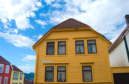 Old yellow house in Absalon Beyers street, Bergen downtown, Norwayの写真素材