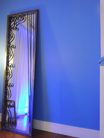 Tall modern mirror adds classy design styleの写真素材