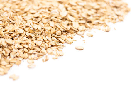 Side view of oat flakes isolated on a white backgroundの写真素材