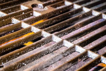 Close up of gas barbecue grill with fire litの写真素材