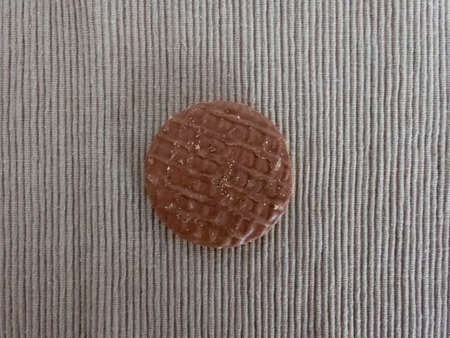 Digestive cookie with chocolate on a gray backgroundの写真素材