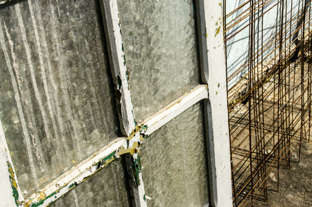 Old window with peeling paintの写真素材