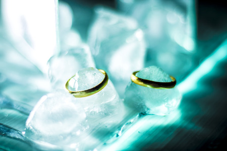 Wedding rings on iceの写真素材
