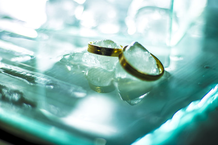 Wedding rings on iceの写真素材
