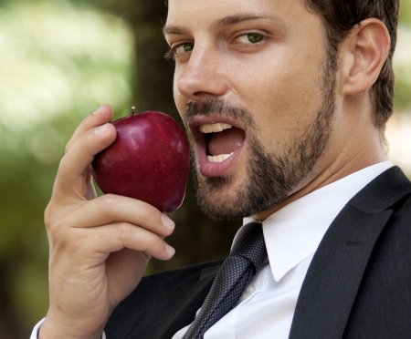 man with appleの写真素材