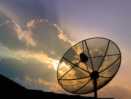 satellite dish antennas on blue sky Backgroundの写真素材