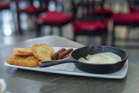 Eggs on a cast-iron skilletの写真素材