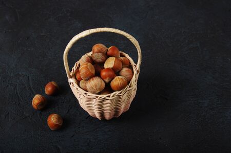 Hazelnuts, filbert on wooden backdrop. heap or stack of hazelnuts. Hazelnut background, healty foodの写真素材
